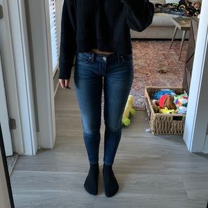 Hudson medium wash low rise jeans